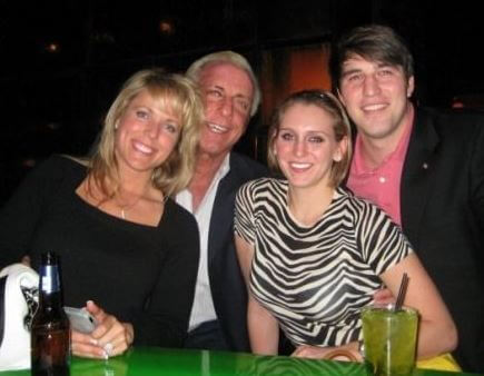 Riki Johnson and his ex-wife Charlotte Flair with Ric Flair and Tiffany.